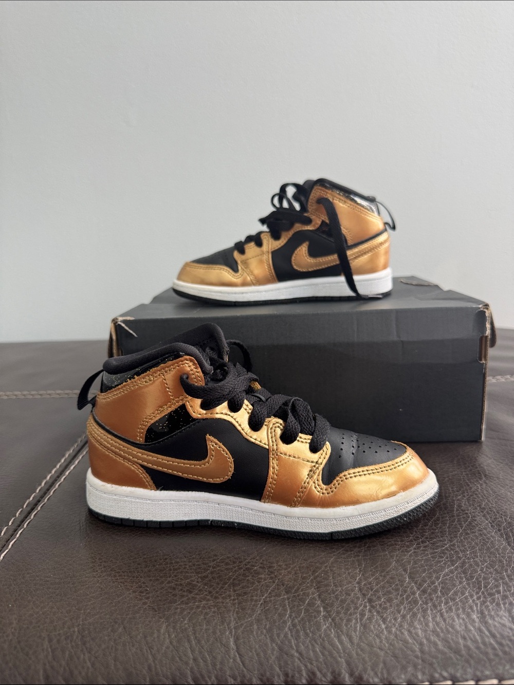 Jordan Kids High-Top Sneakers in Metallic Gold and Black